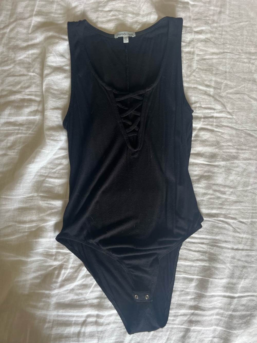 Charlotte Russe Black Sleeveless Bodysuit with Lace-Up Front